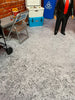 Cracked Concrete with Oil and Paint Spots