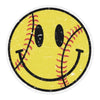 Round yellow softball smiley face vinyl sticker with red softball seams, black oval eyes, a large happy smile, vintage distressed texture, and a white die-cut border.