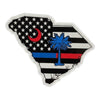 South Carolina state-shaped vinyl sticker featuring a black-and-white American flag, white stars, blue and red horizontal stripes, blue palmetto tree, and red crescent moon.